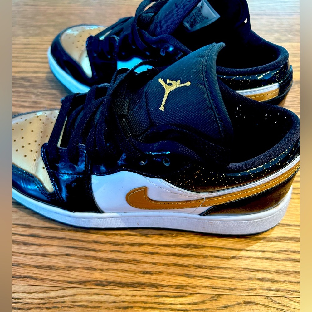 Girls black and gold air Jordan’s